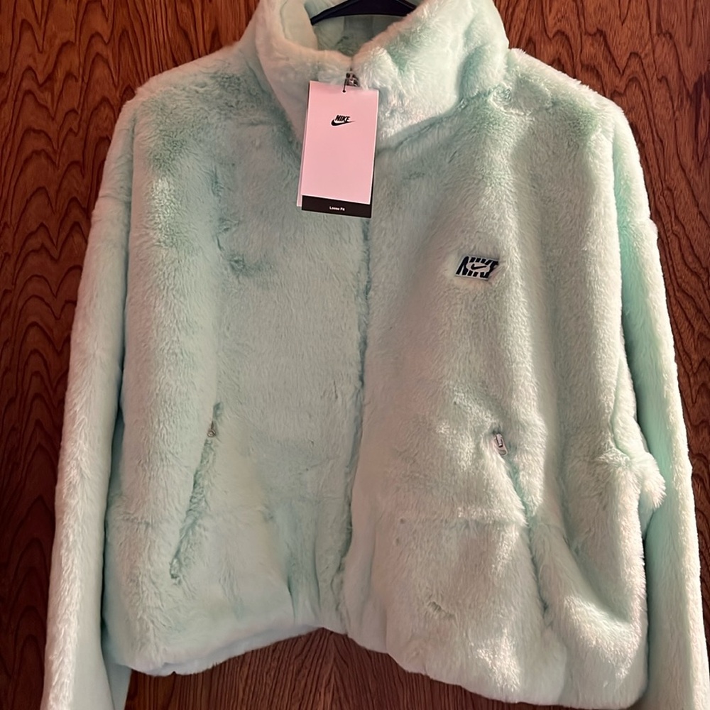 Beautiful light green faux fur Nike jacket size Medium